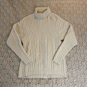 vintage cream colored turtleneck sweater.